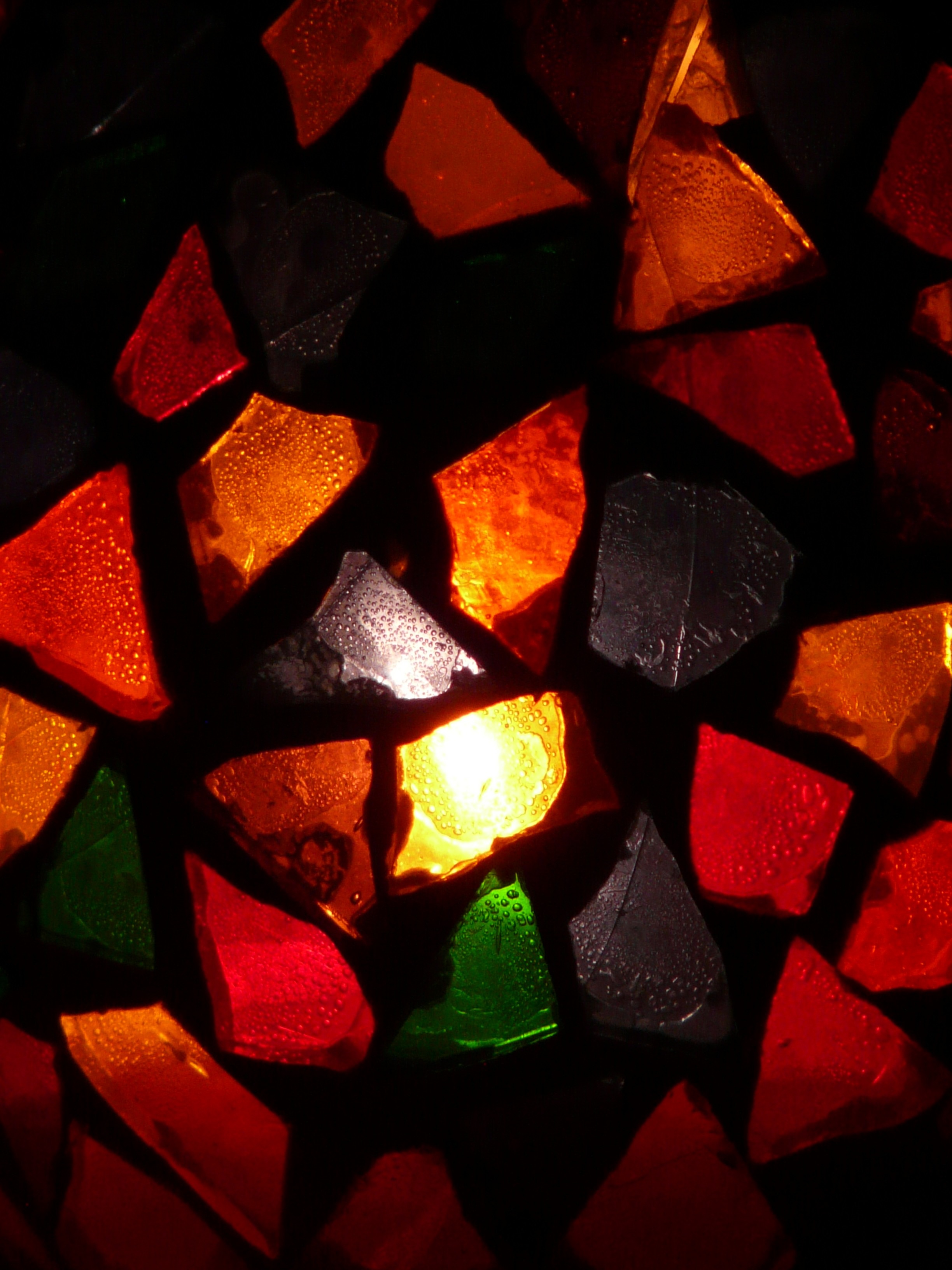 Handcrafted Tiffany-style glass piece glowing with warm light